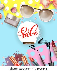 Cosmetics and fashion background with make up artist objects  nail Polish,  lipstick,sunglasses,  mascara, blush . Sale Concept.