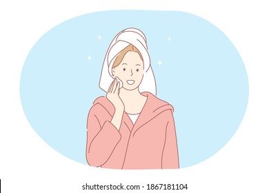 Cosmetics, make up, beauty concept. Young smiling woman cartoon character in towel cleaning face with lotion and cotton pad before going to bed or in morning. Skincare treatment illustration