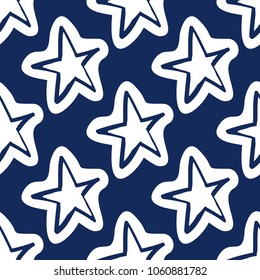 Cosmos patches seamless pattern design with star in doodle style. Cute kids cosmic print on black blue background.