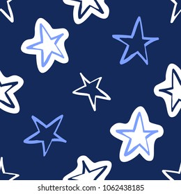 Cosmos patches seamless pattern design with cute little stars in doodle style. Cute kids cosmic print on black blue background.