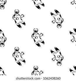 Cosmos patches seamless pattern design with happy astronaut showing thumb up in doodle style. Cute kids cosmic print on black blue background.