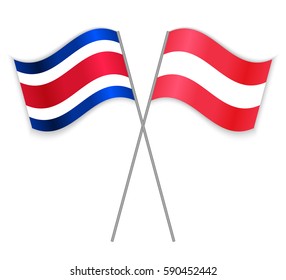 Costa Rican and Austrian crossed flags. Costa Rica combined with Austria isolated on white. Language learning, international business or travel concept.