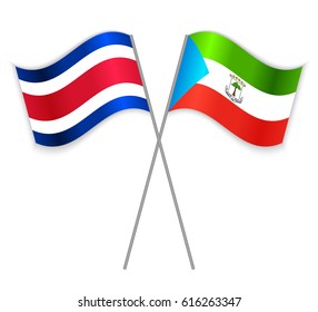 Costa Rican and Equatorial Guinean crossed flags. Costa Rica combined with Equatorial Guinea isolated on white. Language learning, international business or travel concept.