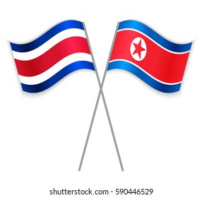 Costa Rican and North Korean crossed flags. Costa Rica combined with North Korea isolated on white. Language learning, international business or travel concept.