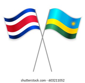 Costa Rican and Rwandan crossed flags. Costa Rica combined with Rwanda isolated on white. Language learning, international business or travel concept.