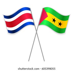 Costa Rican and Sao Tomean crossed flags. Costa Rica combined with Sao Tome and Principe isolated on white. Language learning, international business or travel concept.