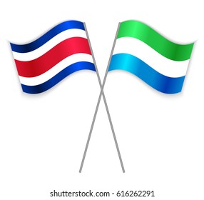 Costa Rican and Sierra Leonean crossed flags. Costa Rica combined with Sierra Leone isolated on white. Language learning, international business or travel concept.