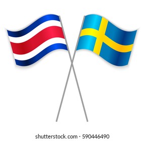 Costa Rican and Swedish crossed flags. Costa Rica combined with Sweden isolated on white. Language learning, international business or travel concept.