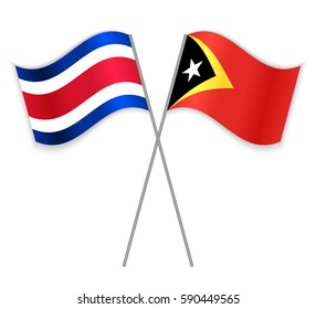 Costa Rican and Timorese crossed flags. Costa Rica combined with East Timor isolated on white. Language learning, international business or travel concept.