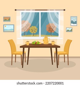 Cosy kitchen interior design with furniture, autumn trees window view. Dining table in kitchen with chairs, cups and teapot, healthy fruit platter, pictures on the wall. Flat design 