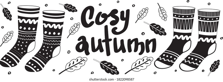 Cosy monochrome warm socks with lettering "Cosy autumn". Men or women clothes isolated on white background. Flat cartoon vector illustration.