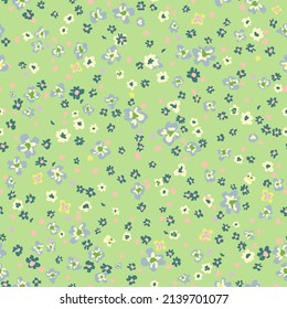 Cottage core floral seamless repeat pattern. Random placed, vector ditsy daisy botanical all over surface print on sage green background.