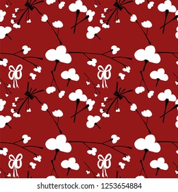 Cotton seamless pattern on red background.