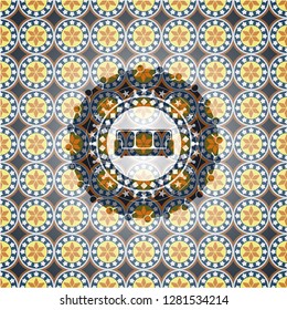 couch icon inside arabesque badge background. arabic decoration.