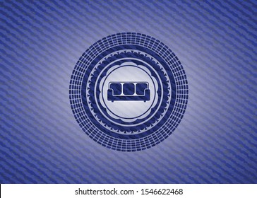 couch icon inside badge with denim background