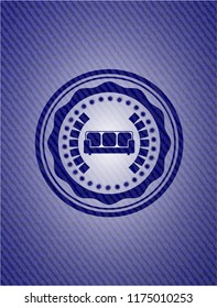 couch icon inside badge with jean texture