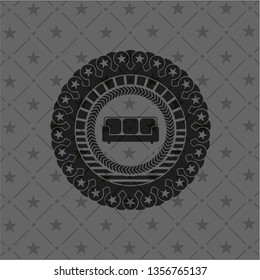couch icon inside black badge