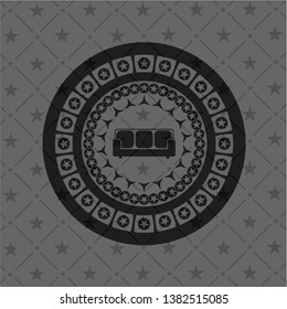 couch icon inside black emblem