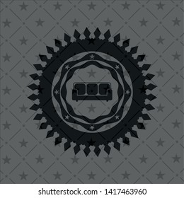 couch icon inside black emblem