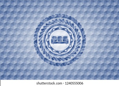 couch icon inside blue badge with geometric pattern.