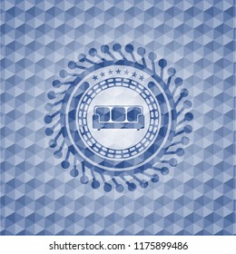 couch icon inside blue emblem or badge with geometric pattern background.
