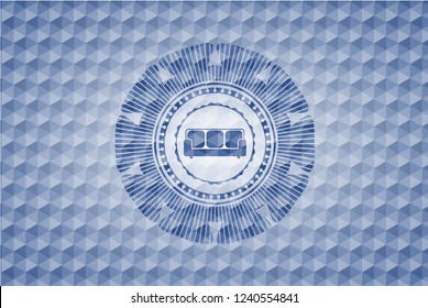 couch icon inside blue emblem with geometric background.