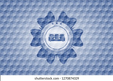 couch icon inside blue emblem or badge with geometric pattern background.