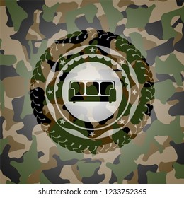 couch icon inside camouflaged emblem
