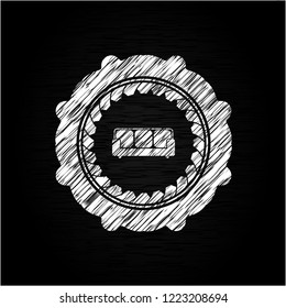 couch icon inside chalk emblem written on a blackboard
