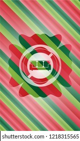 couch icon inside christmas emblem background.