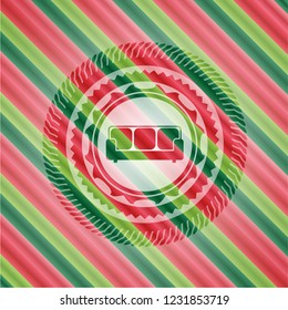 couch icon inside christmas emblem background.
