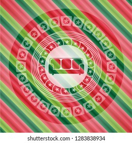 couch icon inside christmas emblem background.