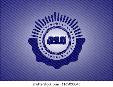 couch icon inside emblem with denim high quality background
