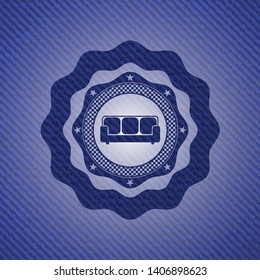 couch icon inside emblem with jean texture