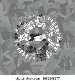 icono del sofá dentro de la textura de camuflaje gris