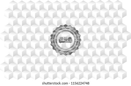 couch icon inside grey icon or emblem with geometric cube white background