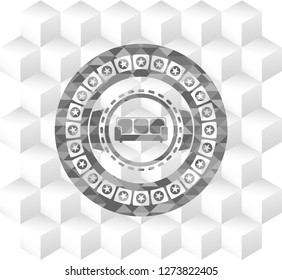 couch icon inside grey emblem with cube white background