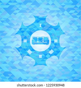 couch icon inside light blue emblem with triangle mosaic background