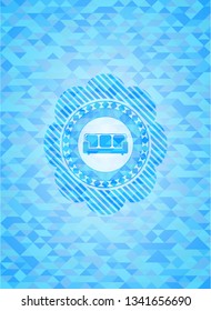 couch icon inside light blue emblem with mosaic background