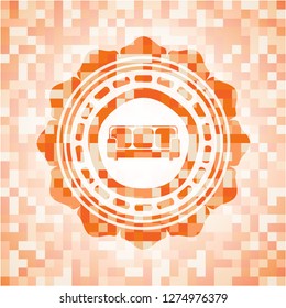 couch icon inside orange mosaic emblem