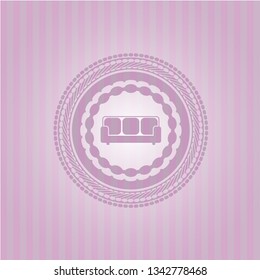 couch icon inside pink emblem. Vintage.