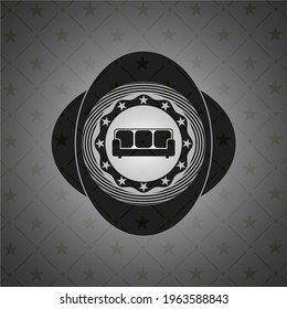 icono del sofá dentro de un emblema oscuro realista. 