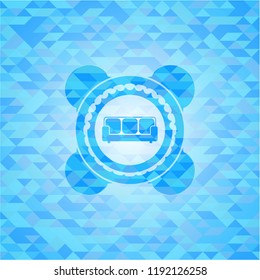 couch icon inside realistic sky blue mosaic emblem