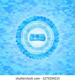 couch icon inside realistic sky blue emblem. Mosaic background
