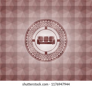 couch icon inside red emblem or badge with abstract geometric polygonal pattern background. Seamless.