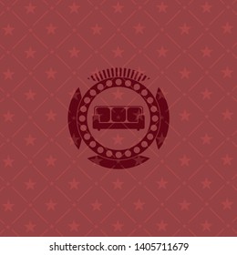 couch icon inside red emblem