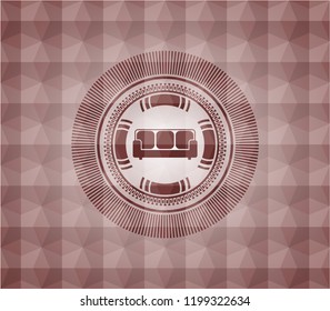 couch icon inside red seamless geometric emblem.