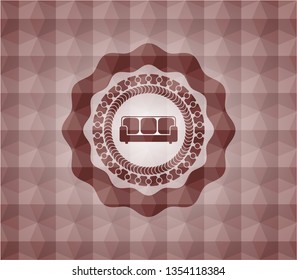 couch icon inside red seamless emblem or badge with abstract geometric pattern background.