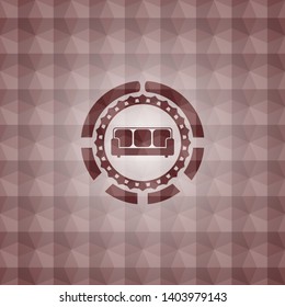couch icon inside red seamless emblem with geometric pattern.
