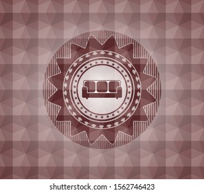 couch icon inside red seamless badge with geometric pattern background.